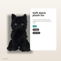 A plush black wolf toy with a soft, furry texture and round plush paws.