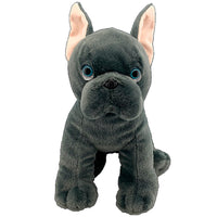 A plush toy of a black dog with large blue eyes and pink ears.