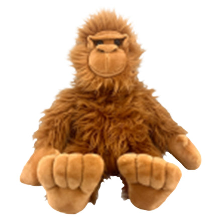 A brown stuffed animal toy, resembling a monkey or gorilla, sitting on its hind legs with its front paws resting on the ground.
