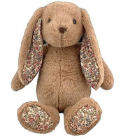 A brown stuffed bunny toy with floral patterns on its ears and feet.
