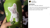 A person's hand holding a green water bottle with a sticker of a dog on it. The person is also wearing green nail polish.