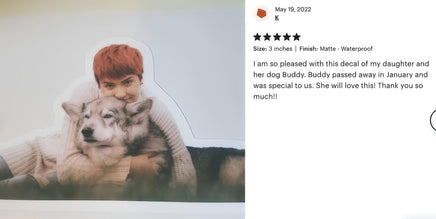 A person is sitting on the ground and hugging a dog, with a rating and comment expressing their appreciation for the dog's memorial.