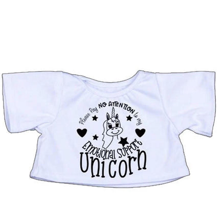 A white t-shirt with a graphic design featuring a unicorn and the text "Please Pay No Attention to my Emotional Support Unicorn".