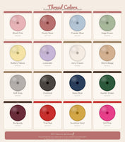 a collection of 16 different thread colors, including pastel shades like pink, blue, green, and more, as well as neutral and vibrant colors like gray, yellow, and red. The thread colors are presented in a grid format, with each color displayed in a circular shape. The image does not contain any text, and the descriptions provided are based on the visual appearance of the thread colors, without any accompanying text.