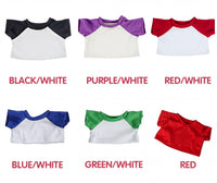 six different t-shirt designs in various colors, including black/white, purple/white, red/white, blue/white, green/white, and red.