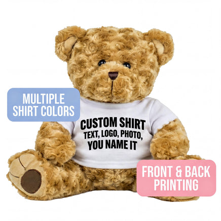 A brown teddy bear wearing a white t-shirt with text printed on it.