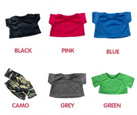 six different t-shirts in various colors, including black, pink, blue, camouflage, grey, and green.