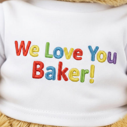 A white t-shirt with colorful embroidered text that says "We Love You Baker!"