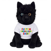 A black stuffed animal dog wearing a white t-shirt with the text "CUSTOM EMBROIDERY SHIRT" printed on it.