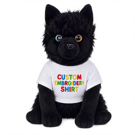 A black stuffed animal dog wearing a white t-shirt with the text "CUSTOM EMBROIDERY SHIRT" printed on it.