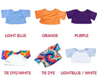 six different colored t-shirts, each with a unique pattern and color, arranged in a grid.