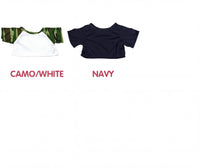two t-shirts, one in camouflage and one in navy, with the text "CAMO/WHITE" and "NAVY" written above them.