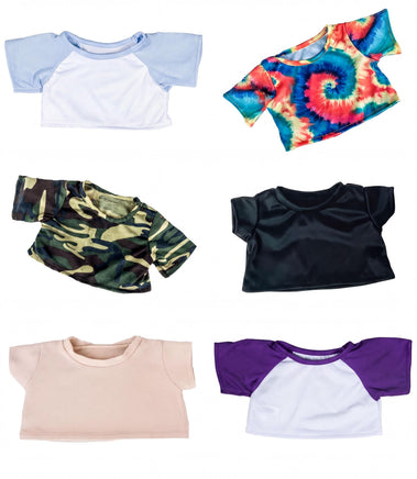 a variety of colorful t-shirts, including a blue and white top, a tie-dye top, a camouflage top, a black top, a pink top, and a purple top.