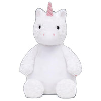 A white plush unicorn toy with a pink horn and tail.