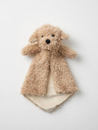 A brown teddy bear with a black nose and eyes is lying on a white background.