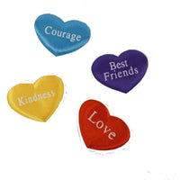 Four satin heart inserts lettered Courage, Best Friends, Kindness and Love included with the poodle plush kit