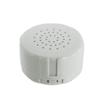Round white voice recorder module that fits inside the poodle plush's hidden pocket