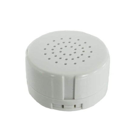Round white voice recorder module that fits inside the poodle plush's hidden pocket