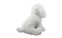 Back view of the white poodle stuffed animal showing its curly tail